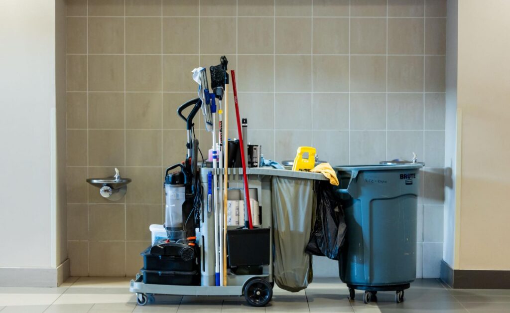 Janitorial equipment staged in a commercial building served by Braintree, MA commercial cleaning services.
