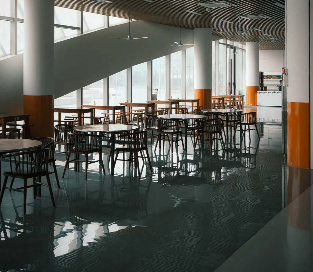 Buffed and polished floors in a high-traffic commercial dining area maintained by Tully's Cleaning Company.