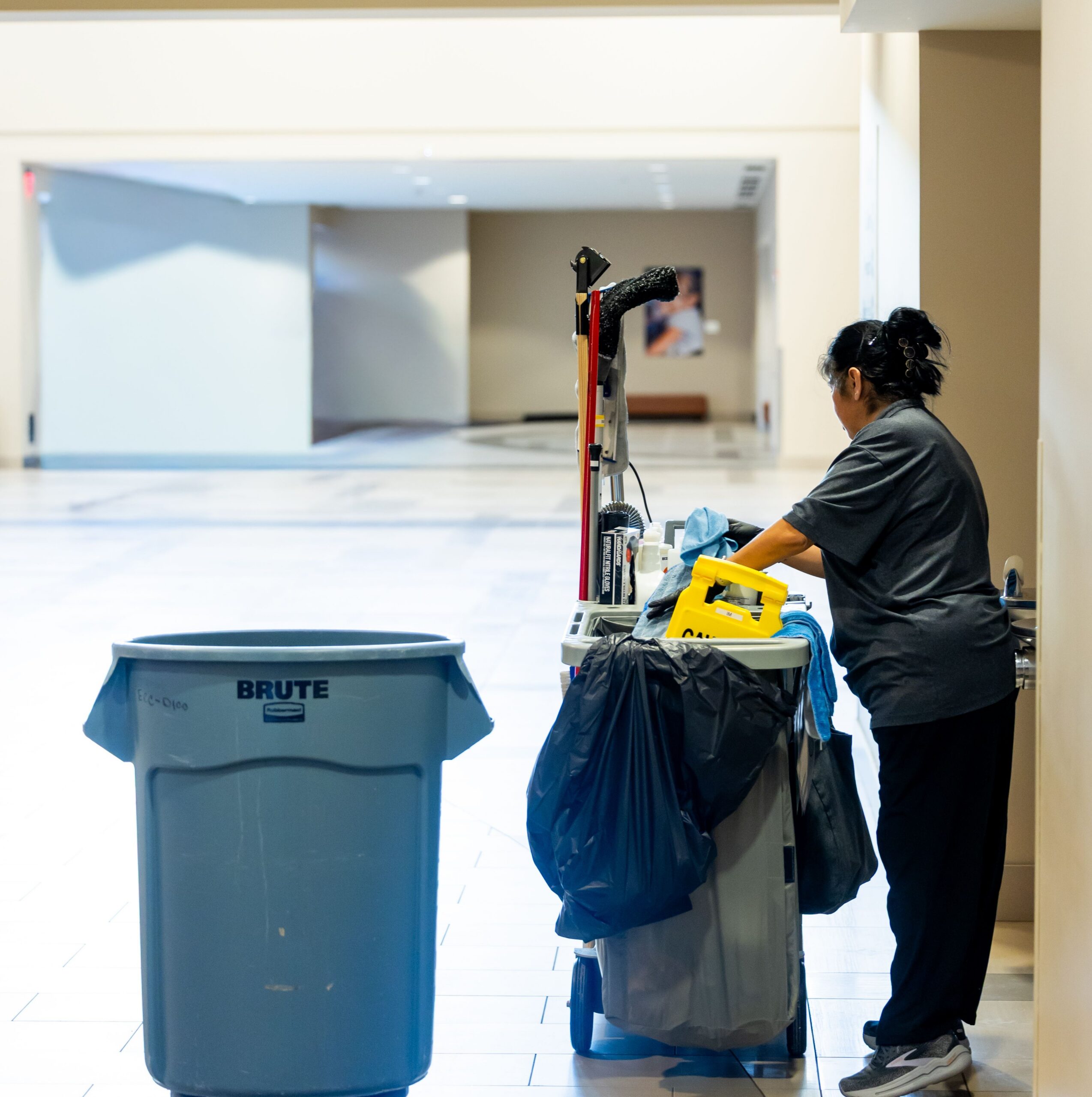 Day porter services keep a commercial building corridor clean during business hours for Tully's Cleaning Company.