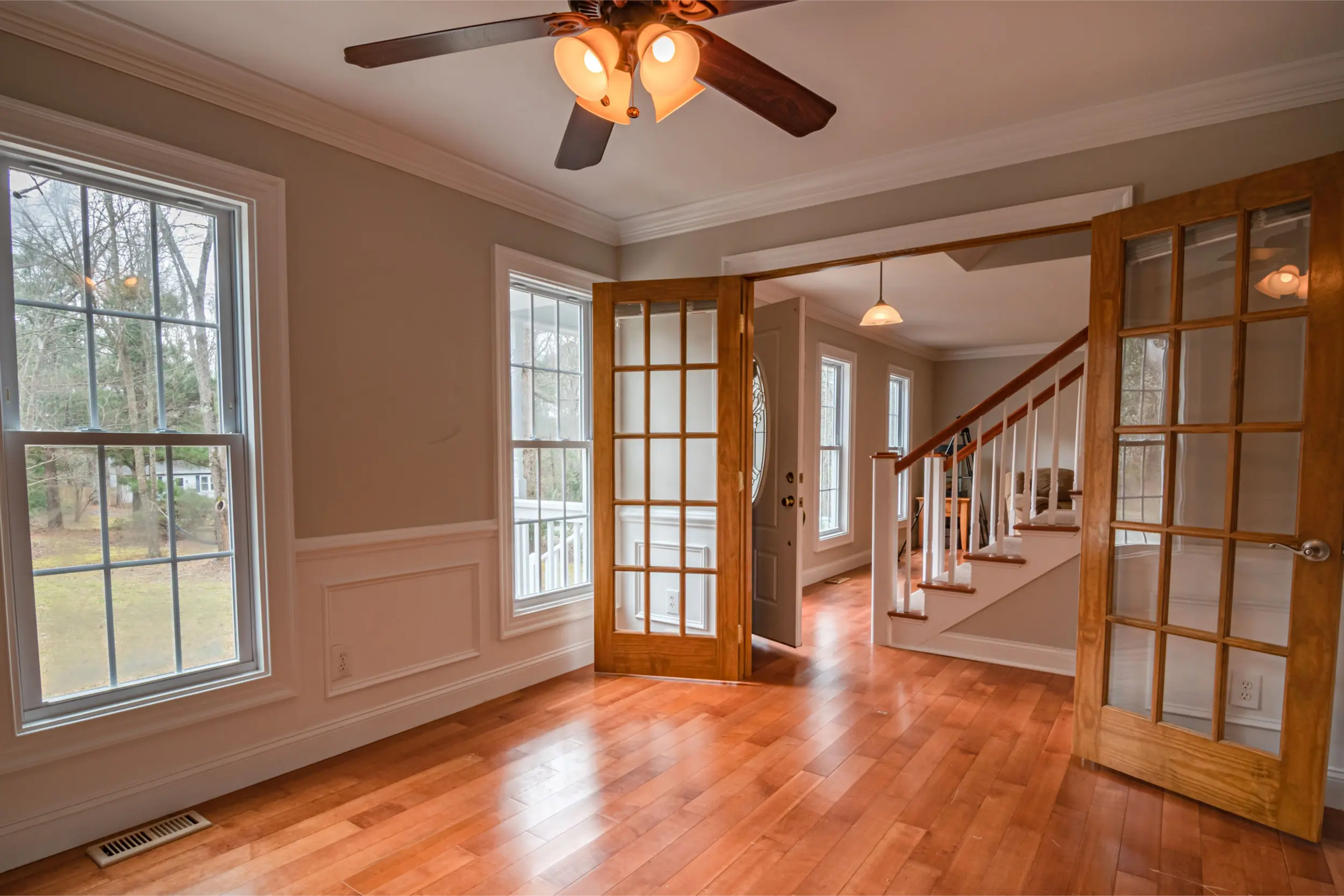 Freshly cleaned hardwood floors in a South Shore home after residential floor cleaning services from Tully's Cleaning Company.